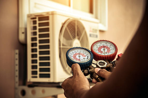 Professional Air Conditioning Service technician working in Laurel, VA